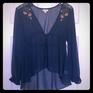 100% polyester floral navy blue blouse.